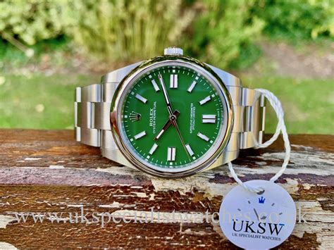 rolex 124300 green dial|rolex oyster perpetual 124300 silver.